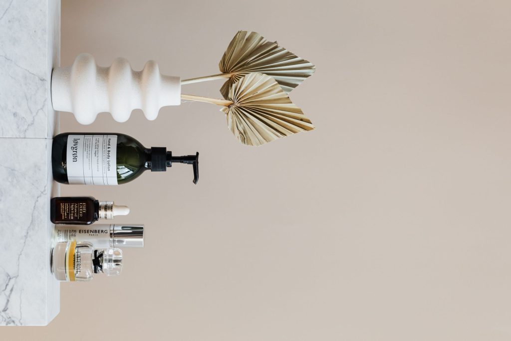 Skincare bottles arranged on a shelf